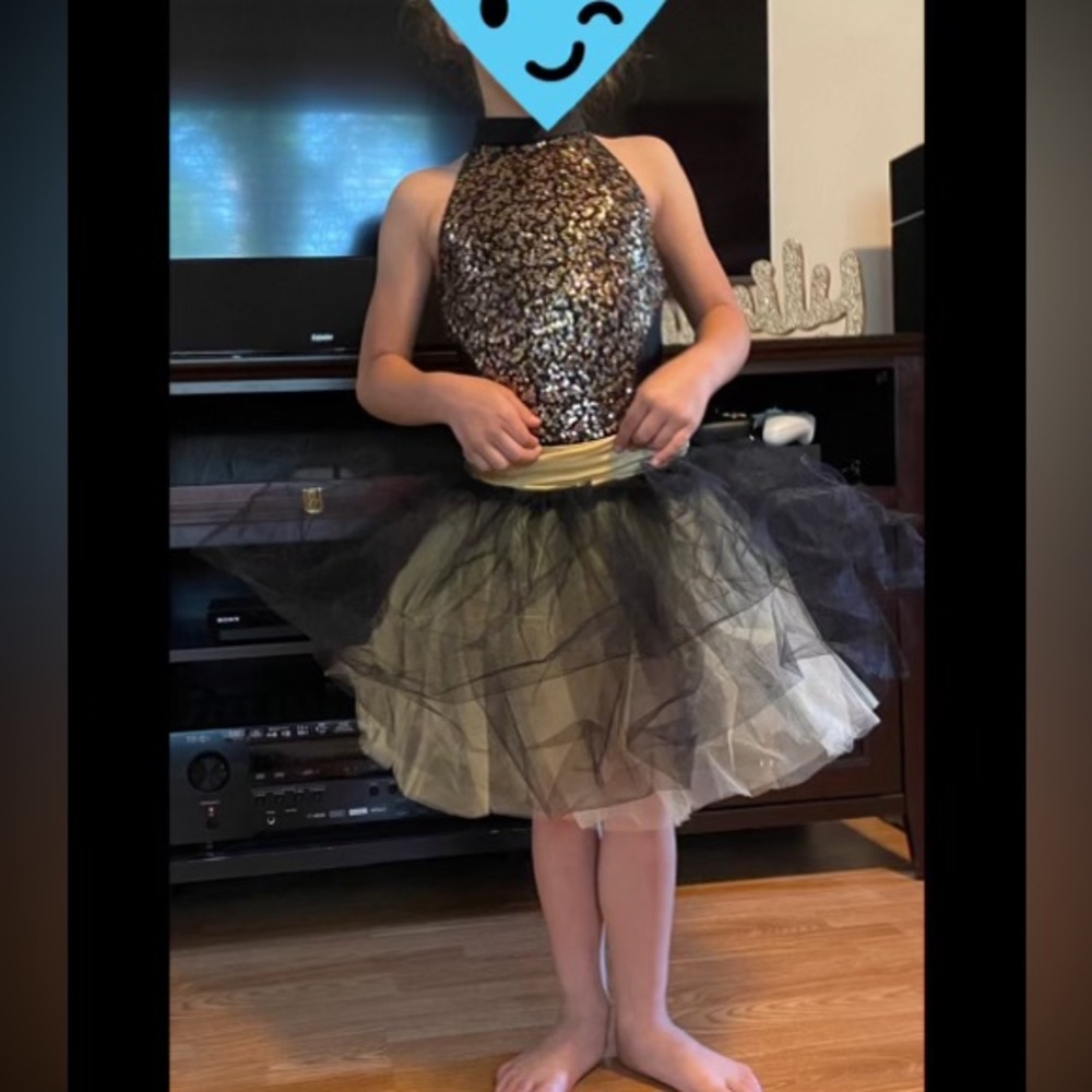 Stunning black and gold ballerina costume. Removable skirt